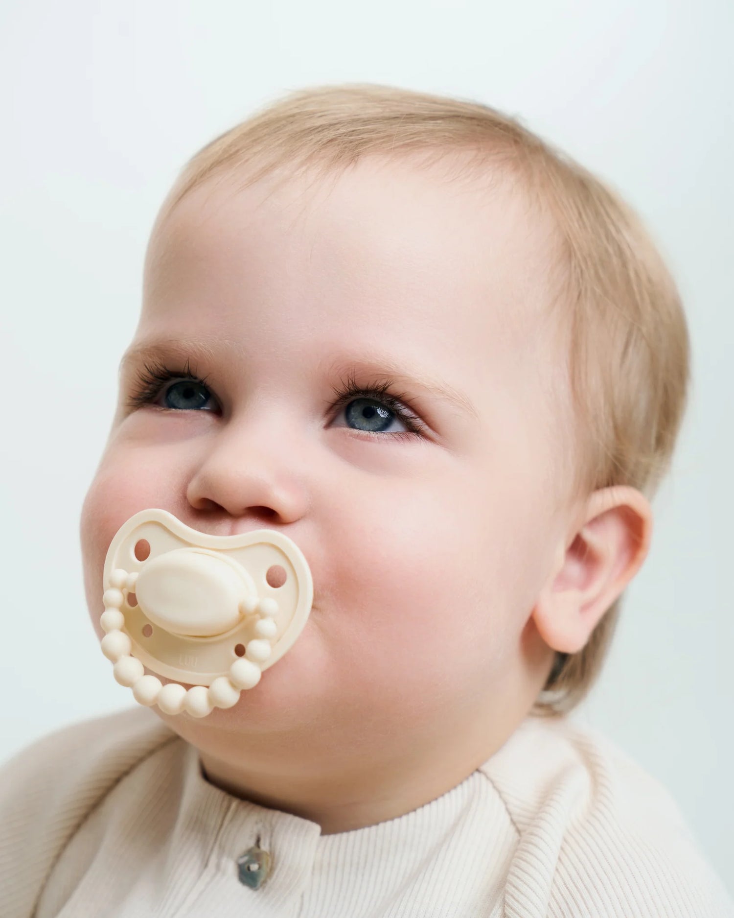 Chupete LUU Kids American Cream Glow - Brilla en la oscuridad