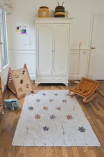 Alfombra de juego Wildflowers de Lorena Canals.